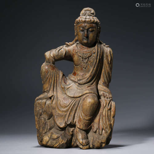A Carved Wood Statue Of Guanyin