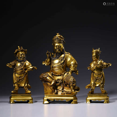 A Set Of Three Gilt-Bronze Figures