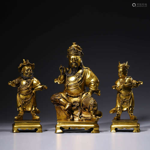 A Set Of Three Gilt-Bronze Figures