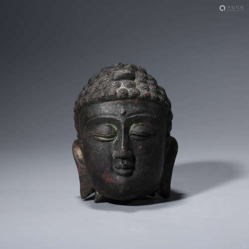 A Bronze Buddha Head