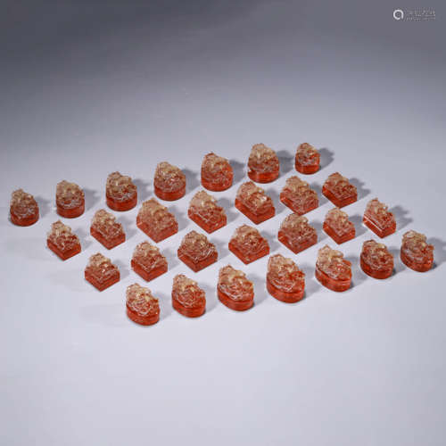 A Set Of 28 Pieces Red Glass Seals