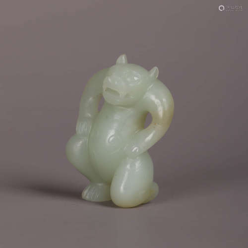 A White Jade Carving Of A Bear
