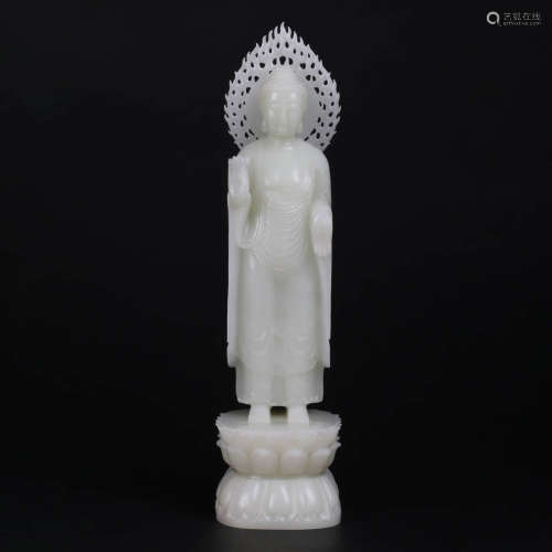 A Carved White Jade Statue Of Shakyamuni