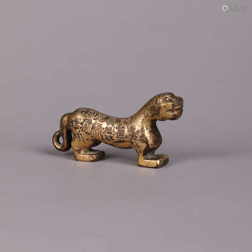 A Gilt-Bronze Beast Ornament