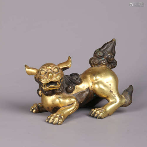 A Gilt-Bronze Kylin Ornament