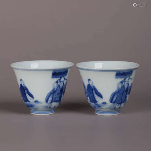 A Pair Of Blue And White Figures Cups