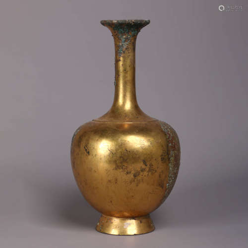 A Gilt-Bronze Phoenix Buddhist Vase