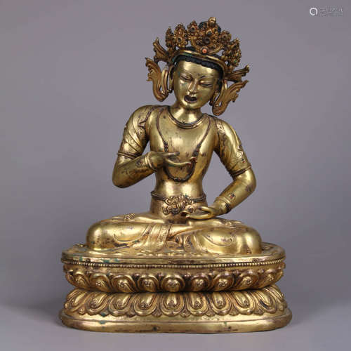 A Gilt-Bronze Statue Of Buddha