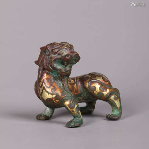A Gilt-Bronze Auspicious Beast Ornament