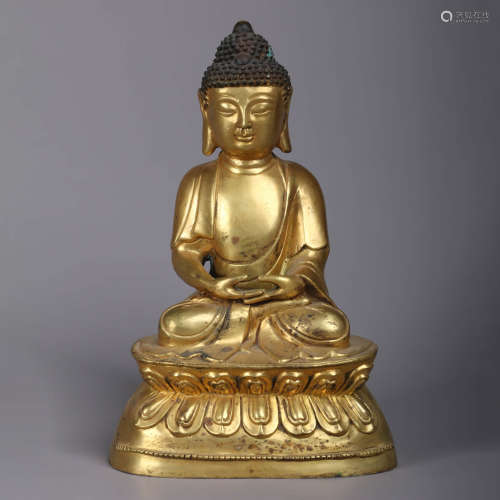 A Gilt-Bronze Statue Of Shakyamuni