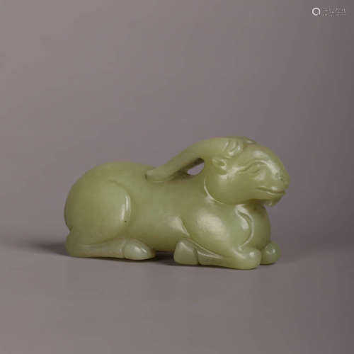 A Yellow Jade Carving Of A Ram