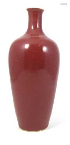 Chinese copper-red glazed baluster form porcelain vase.
