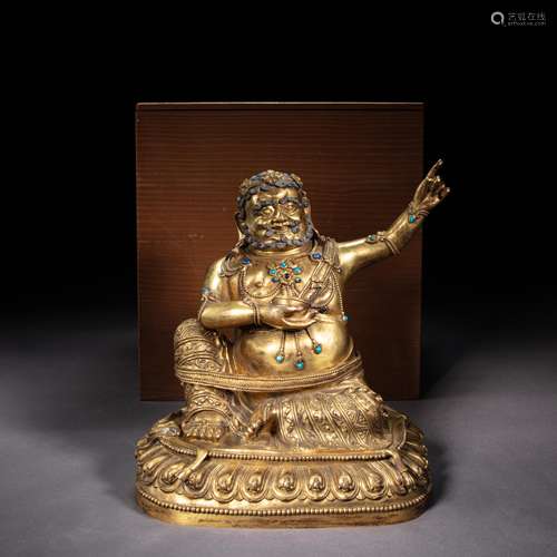 GILT BRONZE STATUE OF THE GREAT ACHIEVER BUDDHA, MING DYNAST...