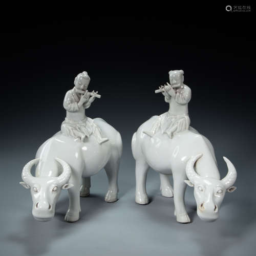 A PAIR OF TIAN BAI YOU BOY HERDING COW, QING DYNASTY, CHINA