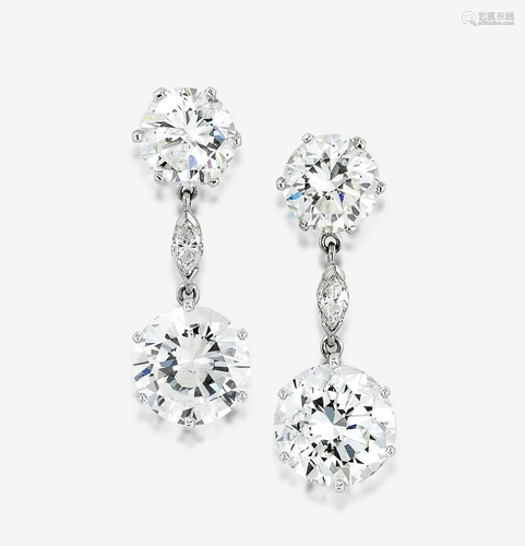 A pair of diamond and eighteen karat white gold