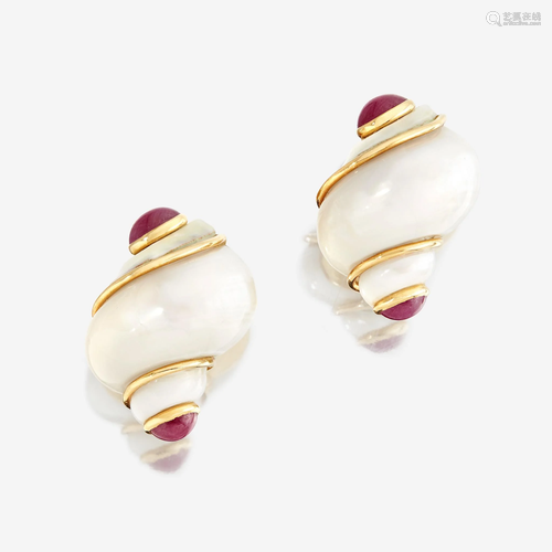 A pair of turbo shell, ruby, and eighteen karat gold