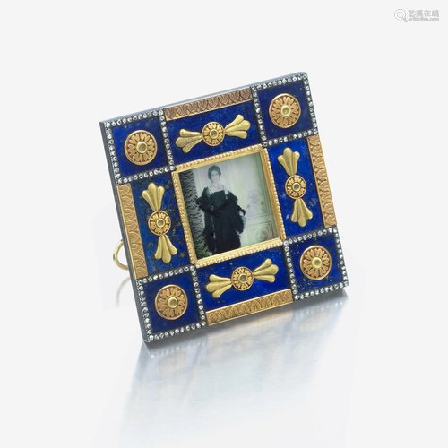 A bicolored gold-mounted lapis lazuli and diamond