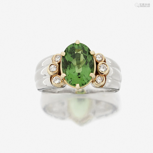 A tsavorite garnet, diamond, and fourteen karat gold