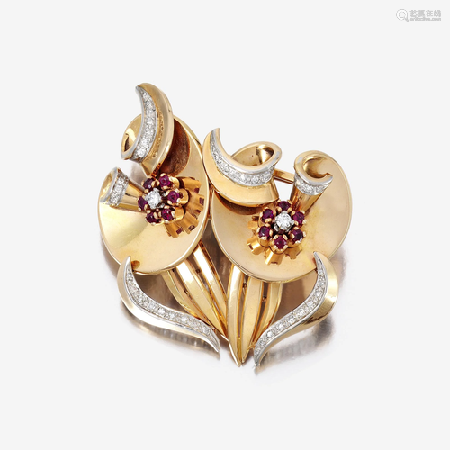 A Retro eighteen karat gold, diamond, and ruby