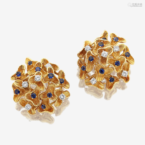 A pair of eighteen karat gold, sapphire, and diamond