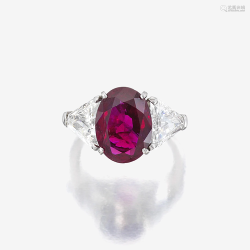 A ruby, diamond, and eighteen karat white gold ring