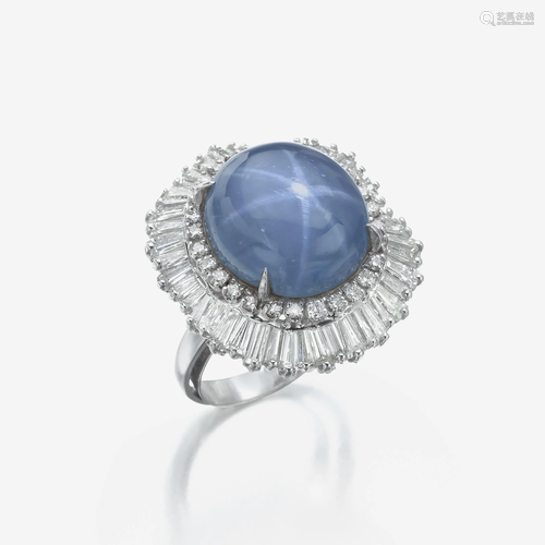 A star sapphire, diamond, and platinum ring