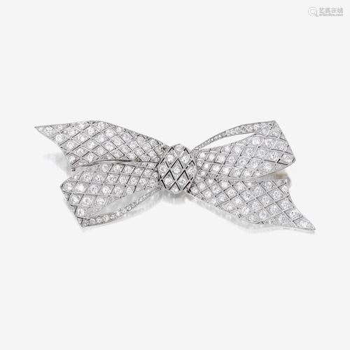 A diamond and platinum brooch