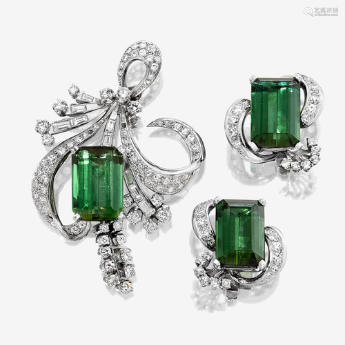 A pair of green tourmaline, diamond, and platinum ear