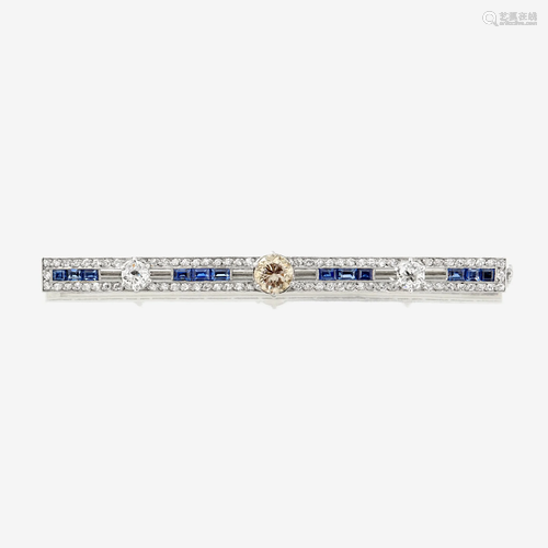 A diamond, sapphire, and platinum brooch