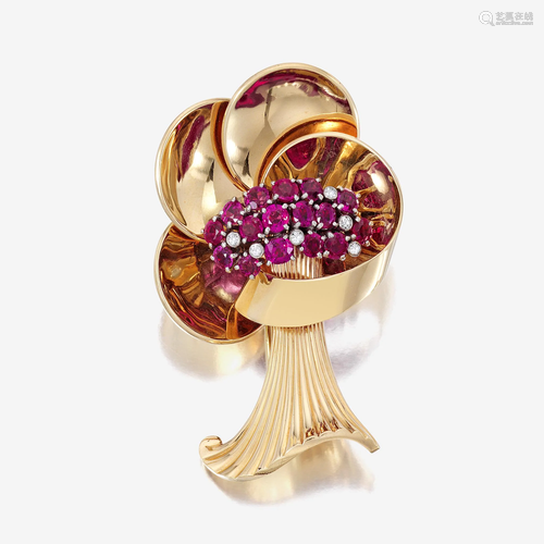 A Retro fourteen karat gold, ruby, and diamond brooch