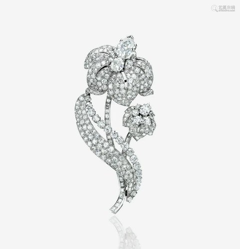 A diamond and platinum clip brooch, Cartier London