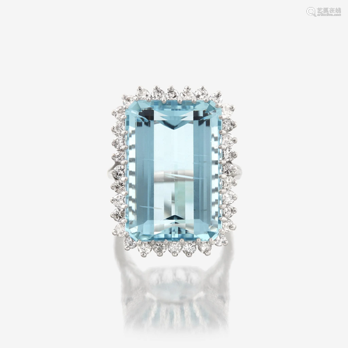 An aquamarine, diamond, and fourteen karat white gold