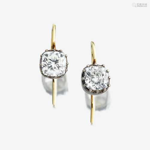 A pair of diamond drop earrings