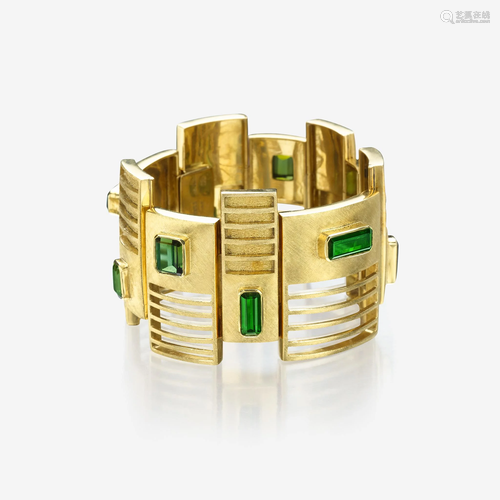 An eighteen karat gold and green tourmaline bracelet,