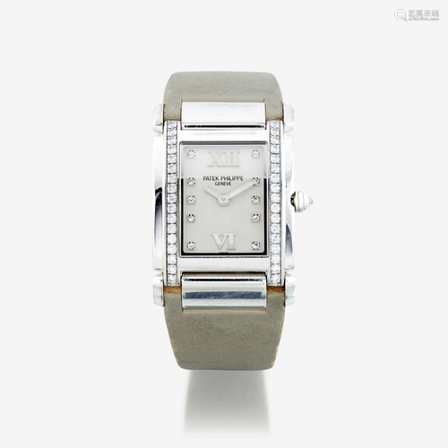 A lady's eighteen karat white gold and diamond, strap