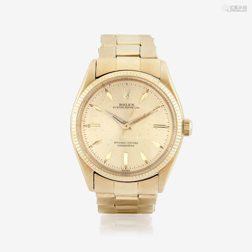 An eighteen karat gold, automatic, bracelet wristwatch,