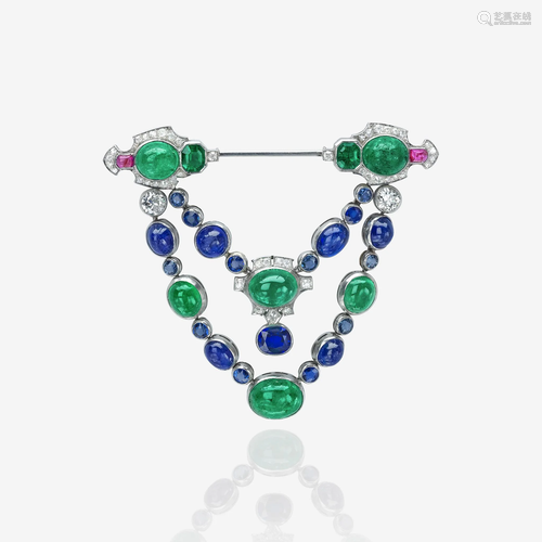 An Art Deco emerald, sapphire, diamond, and ruby jabot