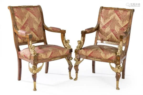 Pair of mahogany armchairs with gilt bronze