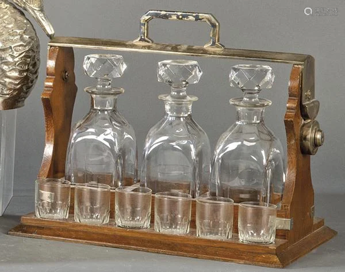 Walnut and metal tantalum with three decanters and 12