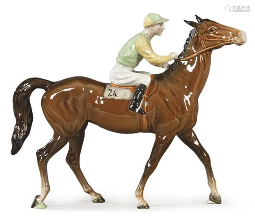 Jockey figure in painted and enameled porcelain by