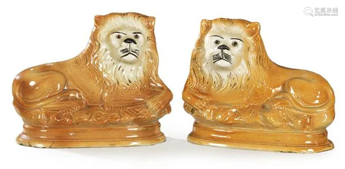 Staffordshire Lion Pair Reclining lion pair in glazed