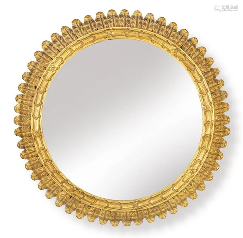 Circular mirror with concentric leaves in carved and