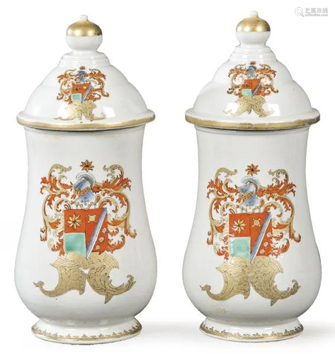 Pair of European porcelain pharmacy jars following the