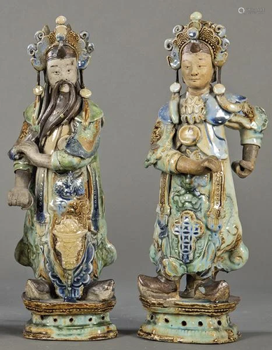 Pair of partially glazed terracotta figures, China,