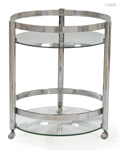 Round table in chromed metal with glass tops. The 60s