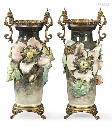 Pair of painted and enameled ceramic vases with large