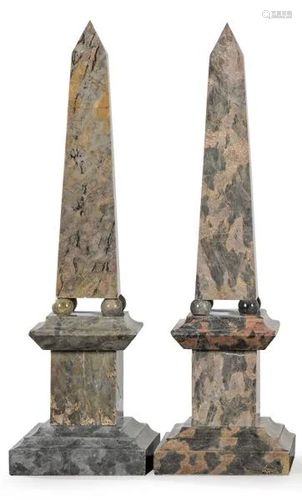 Pair of obelisks carved in gray marble in the first