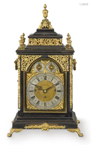 Bracket clock with box in ebonized wood and chiseled