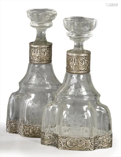 Pair of wheel cut glass decanters and German punched