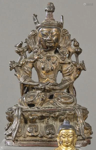 Seated Buddha in bronze with traces of gilding, China